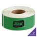 A roll of green TamperSafe labels.