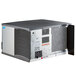 A Manitowoc Indigo NXT air cooled ice machine with a fan on top.