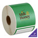 A roll of green TamperSafe paper labels with white customizable text.