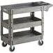 A Lavex medium gray plastic utility cart with three shelves and wheels.