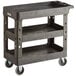 A black plastic Lavex utility cart with three shelves and wheels.