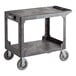 A Lavex black plastic utility cart with wheels.