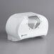 A white San Jamar double roll toilet paper dispenser with a clear window.