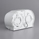A white plastic San Jamar toilet tissue dispenser with two circular holes on top.