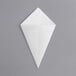 A white paper folded into a triangle shape.