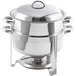 A stainless steel round soup chafer with chrome accents and a lid.