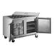 A Beverage-Air stainless steel commercial refrigerator with two sliding doors.