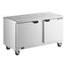 A stainless steel refrigerated salad bar and cold food table with two doors and caster wheels.