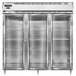 A stainless steel Continental Refrigerator with three glass doors.