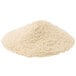 A mound of light beige, finely ground all-purpose breading mix.