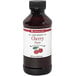 A bottle of LorAnn Oils 4 fl. oz. Cherry Super Strength Flavor on a counter.