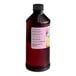 A close-up of a LorAnn Oils bottle of pink liquid with a label.