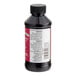 A close up of a LorAnn Oils 4 fl. oz. bottle of Strawberry Bakery Emulsion with a white label.