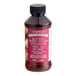 A bottle of LorAnn Oils Buttery Sweet Dough Bakery Emulsion on a counter.