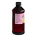 A close up of a 16 fl. oz. bottle of LorAnn Hazelnut Bakery Emulsion with a pink and black label.