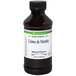 A 4 fl. oz. bottle of LorAnn Oils All-Natural Creme de Menthe Super Strength Flavor with a label.