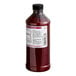 A bottle of LorAnn Oils Strawberry Bakery Emulsion, a red liquid in a clear jar.
