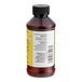 A close-up of a LorAnn Oils 4 fl. oz. bottle of Butter Bakery Emulsion with a black cap and label.