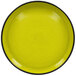 A green RAK Porcelain deep porcelain plate with a black rim.