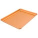 A close-up of a Chicago Metallic Textured Copper Bakery Display Tray.