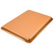 A Chicago Metallic copper bakery display tray on a table.