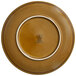 A brown porcelain coupe plate with a white rim.