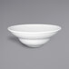 a white bowl on a gray background