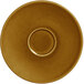 A brown RAK Porcelain saucer with a circle in the middle.