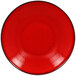 A red porcelain coupe plate with a black rim.