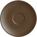 a brown plate with a circle in the middle