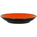 A black and orange RAK Porcelain deep coupe plate.