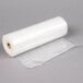 A roll of clear plastic vacuum packaging bags.