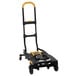 A black and yellow Cosco 2-in-1 folding hand truck.