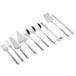 A close-up of a Choice 10-piece stainless steel buffet serving utensils set with hollow handles.