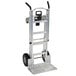 A silver Cosco hand truck with black wheels.