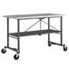 A grey metal Cosco folding work table with wheels.