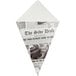 A newspaper cone folded into a triangle on a counter.