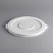 A white plastic lid with a circle on it.