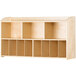 A natural wood wall-mount diaper organizer with 11 compartments.