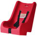 A red Foundations infant seat with a black 5-point harness.