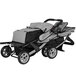 A grey and black Foundations Trio Sport stroller with canopies over three seats.