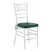 A white wood Chiavari chair with a green cushion.
