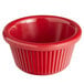 a red bowl with a white background