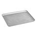 A full size, heavy-duty, fully perforated aluminum sheet pan with a wire rim.