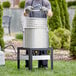 a person standing on a fire pit