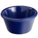 A blue Acopa melamine ramekin.