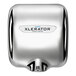 A chrome plated XLERATOR hand dryer with a silver cover.