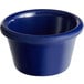 A blue Acopa melamine ramekin.