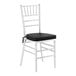 A white wood Chiavari chair with a black cushion.