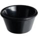 An Acopa black smooth melamine ramekin with a white background.